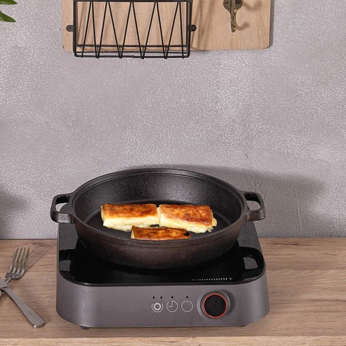 Versatile cast iron pan - cast,