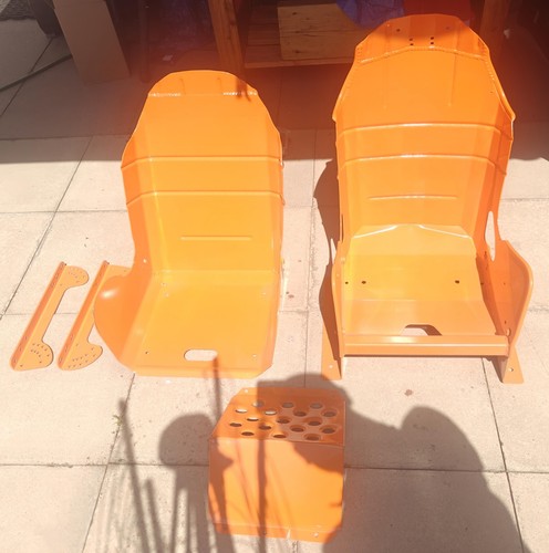 Orange metal bucket seats - orange, with