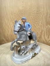 PORCELAIN FIGURINE OF A HORSE RIDER AND HOUND (137A)