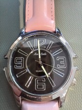Monteo Carlo watch with black face and pink strap, new battery