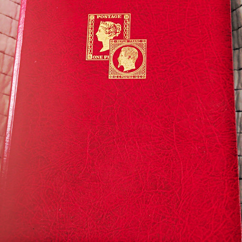Stamp album with several - , and