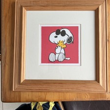 Snoopy And Woodstock Hugging Framed Print