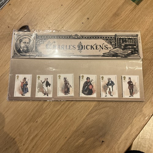 Charles dickens with mini - dickens,