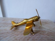 Vintage Brass Spitfire on Moving Wheels