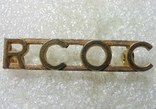 Royal Canadian Ordnance Corps Collar or  Shoulder Badge?