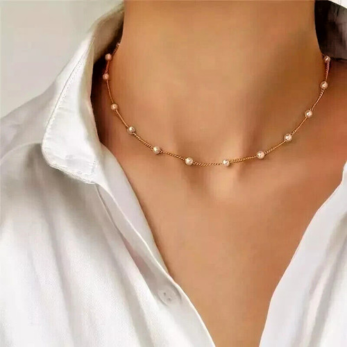Gold coloured necklace with - coloured,