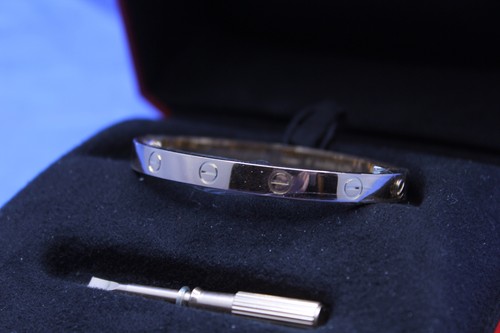 Unworn cartier love bracelet - unworn,