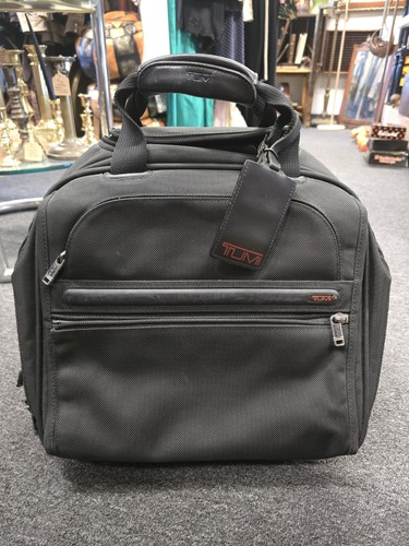 Tumi roller bag black - tumi,