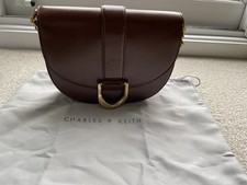 Charles and Keith Gabine Saddle Bag NEW WITH TAGS and Has Extra Shoulder Strap