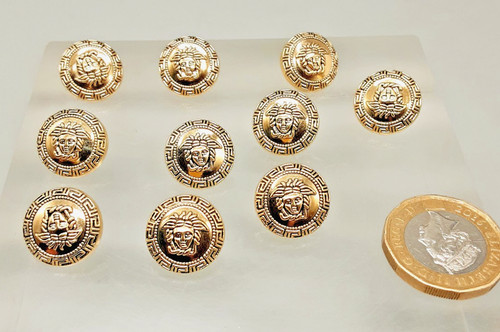 Gold tone medusa head - 10,