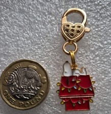 Snoopy Christmas enamel charm on large lobster clasp. 