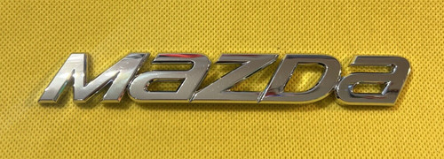 Mazda car emblem - car,