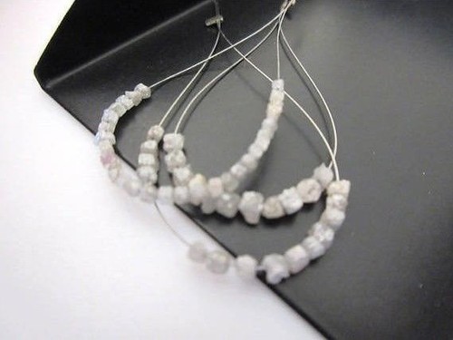 Carat tiny 1mm - tiny, white