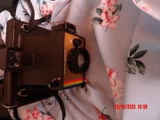 vintage polaroid land camera colour swinger