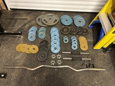 83kg Metal & 70 Moulded Weights. 1 x Metal EZbar, 2 x Dumbbell Bars, One Bench.