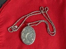 A Large Vintage Silver Locket