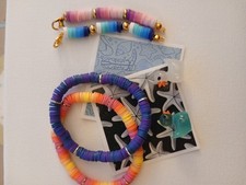 Set Of 2 Clay Bead Bracelets With 2 Keychains, 2 Stickers And 2 Ducks