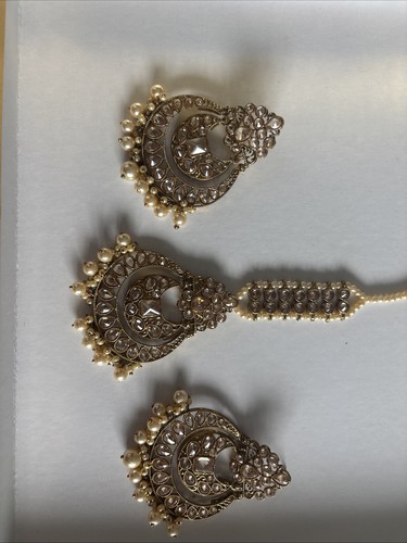 Indian tikka and earring set - and,