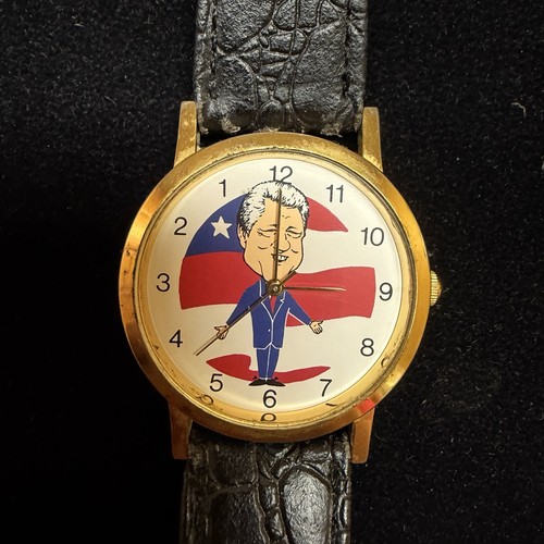 Bill clinton watch backwards - clinton,