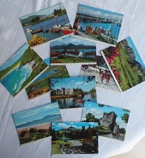 11 different colour postcards