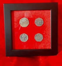 Framed Commemorate UK 50 Pence Pieces.