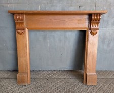 A RECLAIMED OAK FIRE SURROUND