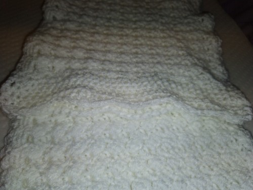 Crocheted white shawl