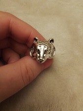 Tiger made from unknown metal and size UK Q+1/2 and USA size 8.25
