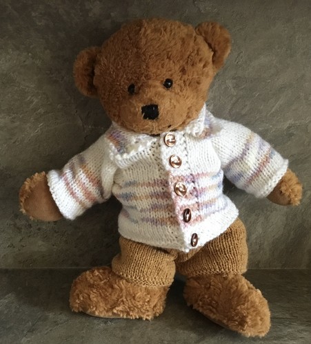 Hand knitted teddy - hand,