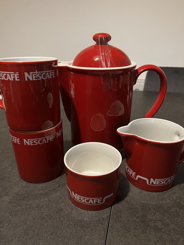 Nescafe red and white coffee - and,