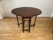 Vintage Solid Oak Gateleg Drop Leaf Oval Dining Table With Barley Twist Design