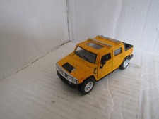 Kinsmart - 1:40 Scale Model 2005 Hummer H2 SUT Yellow (BBKT5097DY)