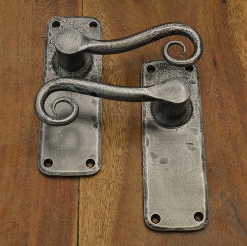 Door handles rat tail style