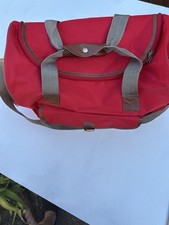 Travelling Holdall 17" red in very good condition with shoulder  strap