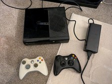 Microsoft Xbox 360 E Console and some working accessories