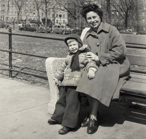1957 woman boy - 1957, sitting