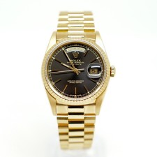 Rolex Day-Date 18238 with Black Baton Dial