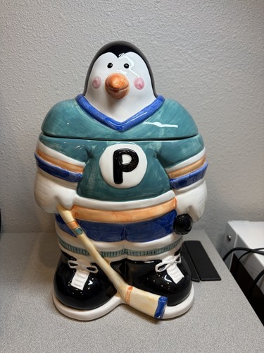 Hockey playing penguin - playing,