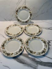 Five Royal Doulton 8 Inch