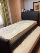 John Lewis hardly used single wooden framed trundle beds with mattresses.