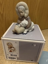 Lladro Eskimo Playing Boy With