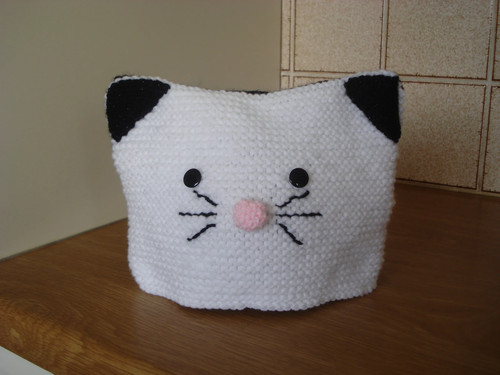 Knitted cat tea cosy with - cat,