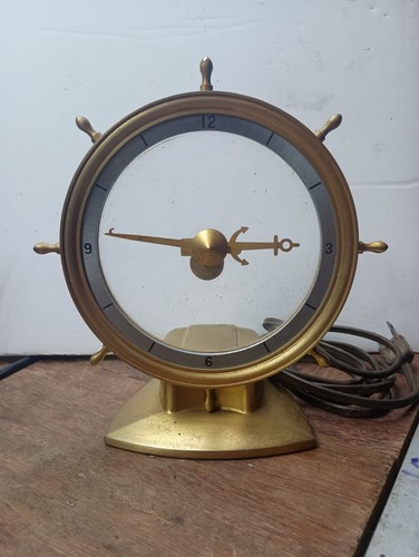 Golden helm clock - golden,