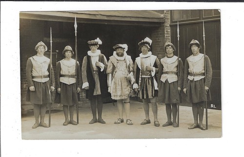 Seven men dressed - dressed, in