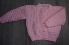 Hand knitted baby girl pink