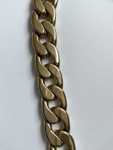 Chunky gold tone curb chain