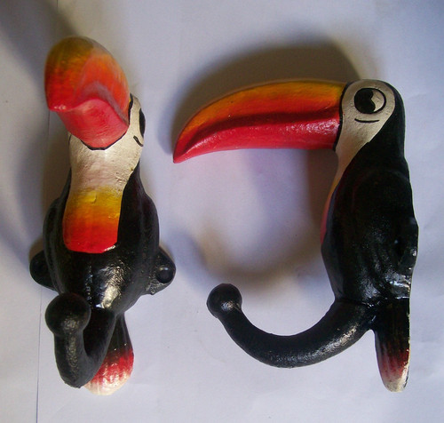 Pair toucan hooks hand - of,