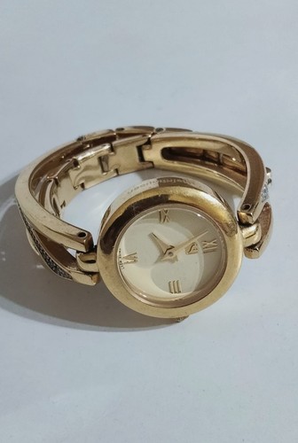 Luxury gold tone swiss watch - gold-tone,