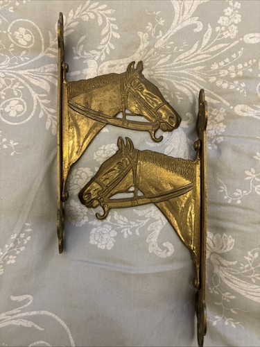 Pair vintage brass horse - of,