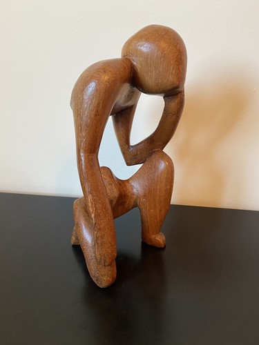 Hand carved thinking man - thinking,